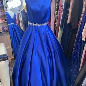 Elegant Blue Gown with Embellished Waist